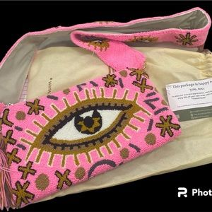 Pink handmade evil eye bag